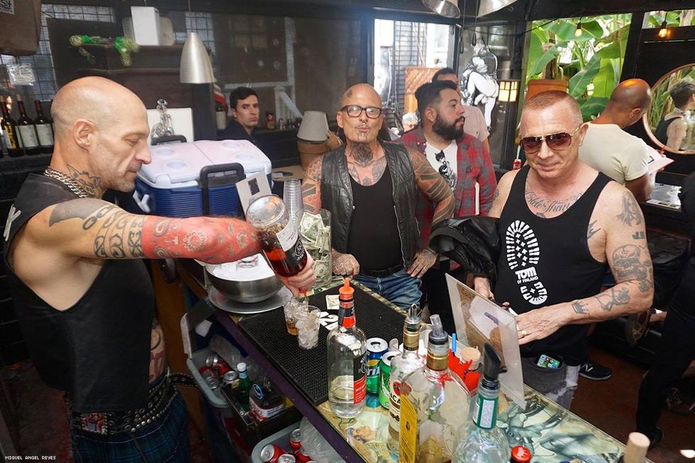 Ron Athey works the bar.