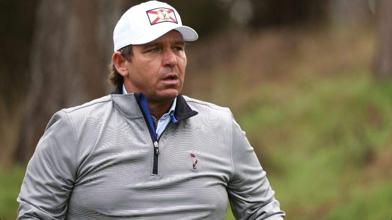 ron desantis in a golf outfit