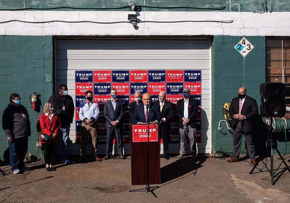 rudy giuliani donald trump legal team parking lot press conference
