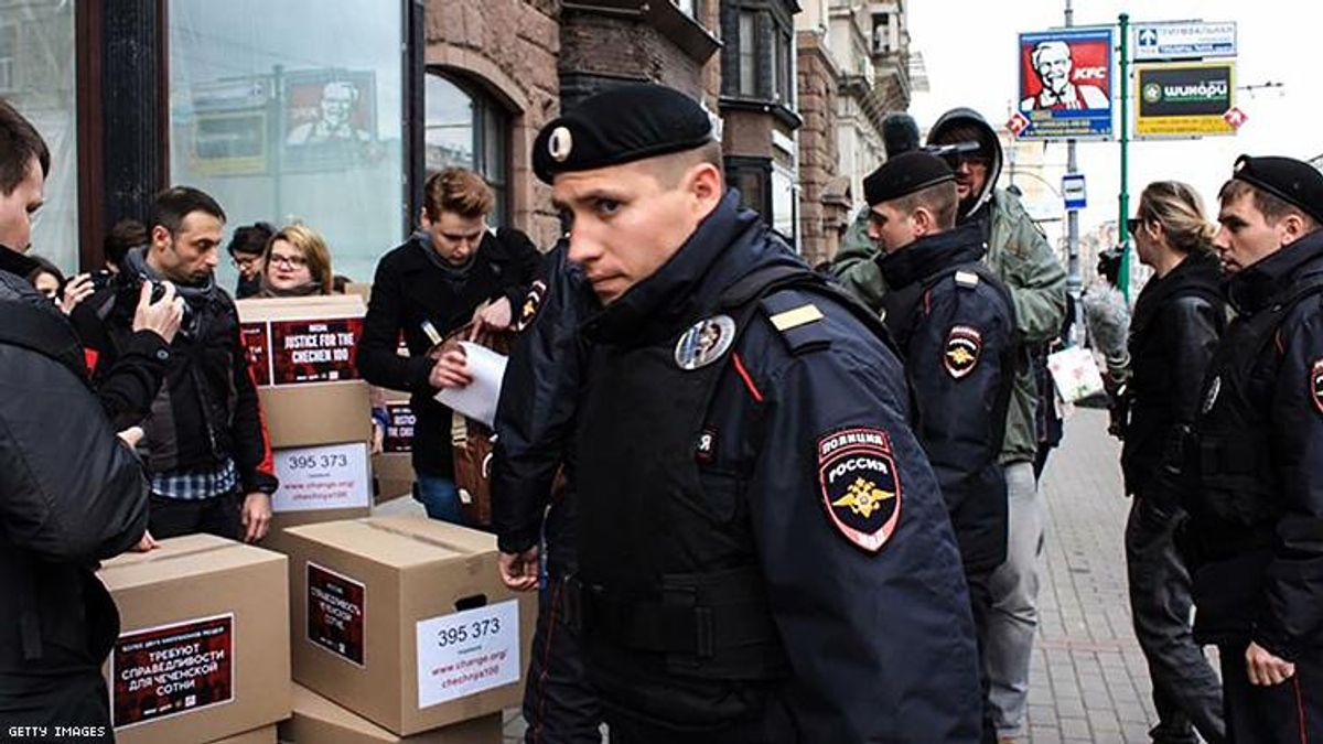 Russian policemen surround Russian gay rights activists in Moscow in 2017.