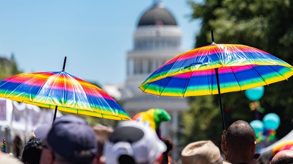 Sacramento Transgender Sanctuary City Queer Rainbow Umbrellas LGBTQ Pride Parade California State Capitol Building