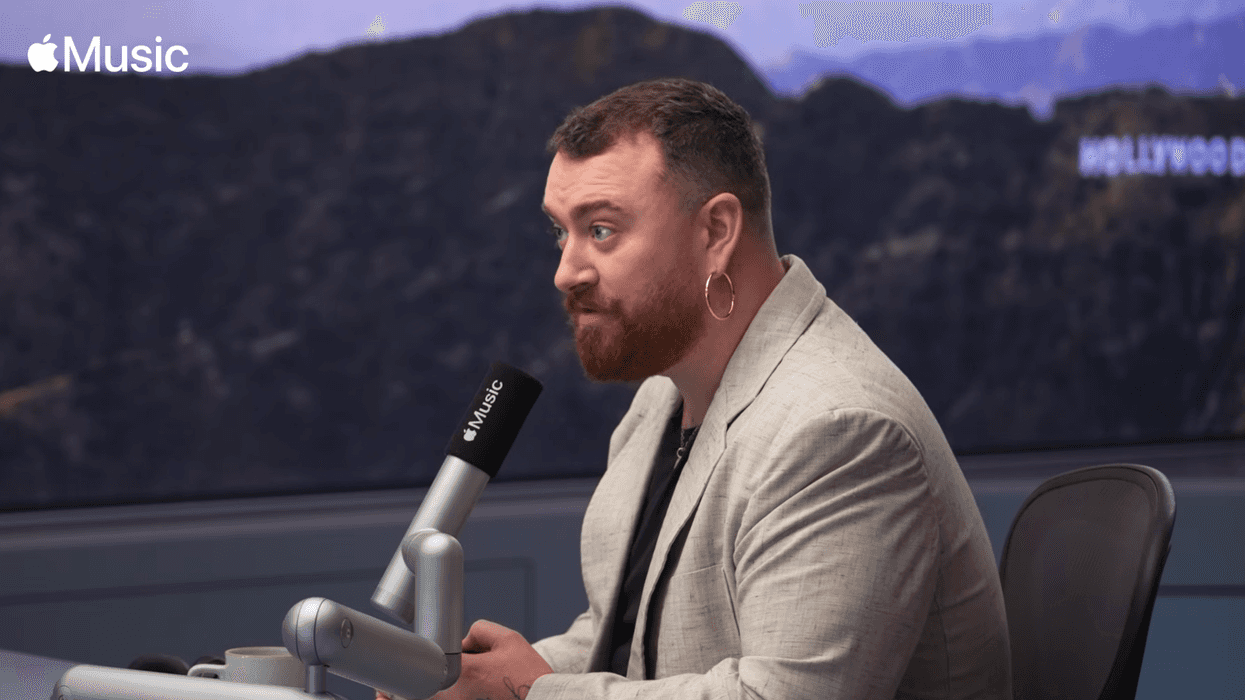Sam Smith speaking into a microphone