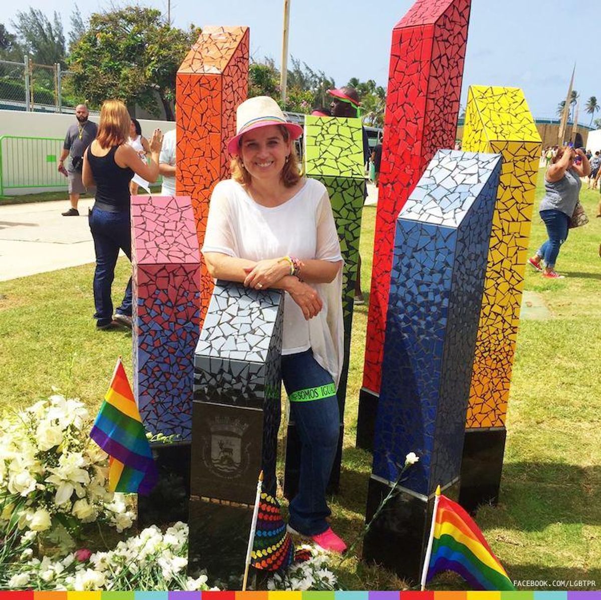 San Juan mayor Carmen Yulín poses in front of the first LGBT monument in Puerto Rico