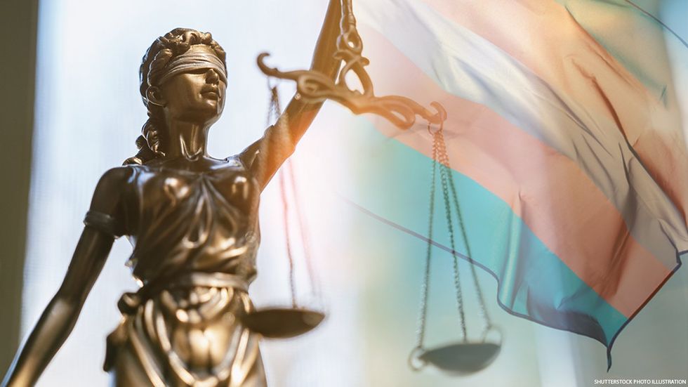 Scales of justice and trans flag