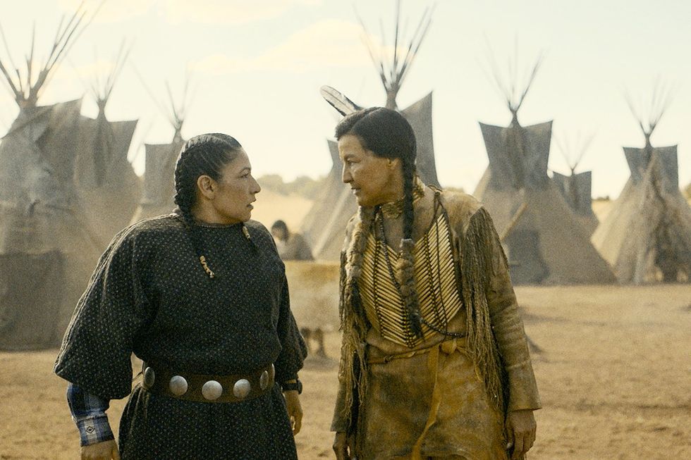 Scene from Outer Range season 2 with Joy speaking to another person