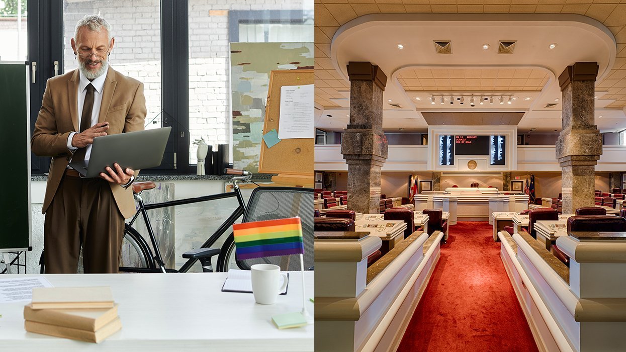 school teacher with rainbow lgbtqia pride flag on desk alongside House of Representatives chamber Alabama State House in Montgomery