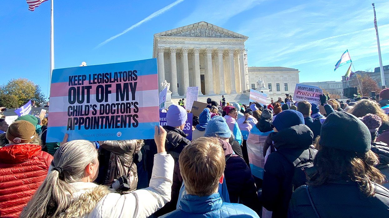 SCOTUS protest gender affirming care case sign says keep legislators out of child doctor appointments
