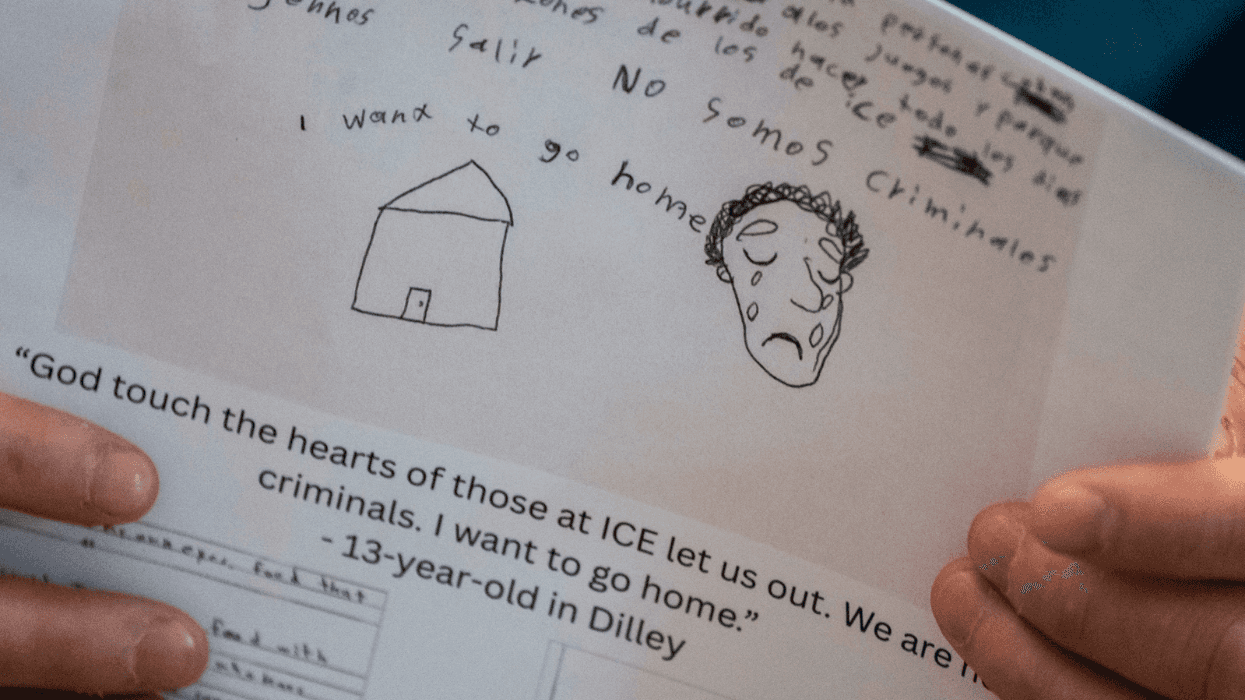 Sen. Andy Kim holds a handwritten letter and drawing from a child detained at the Dilley immigration detention center during an advocacy event with children's entertainer Ms. Rachel in Washington, D.C.