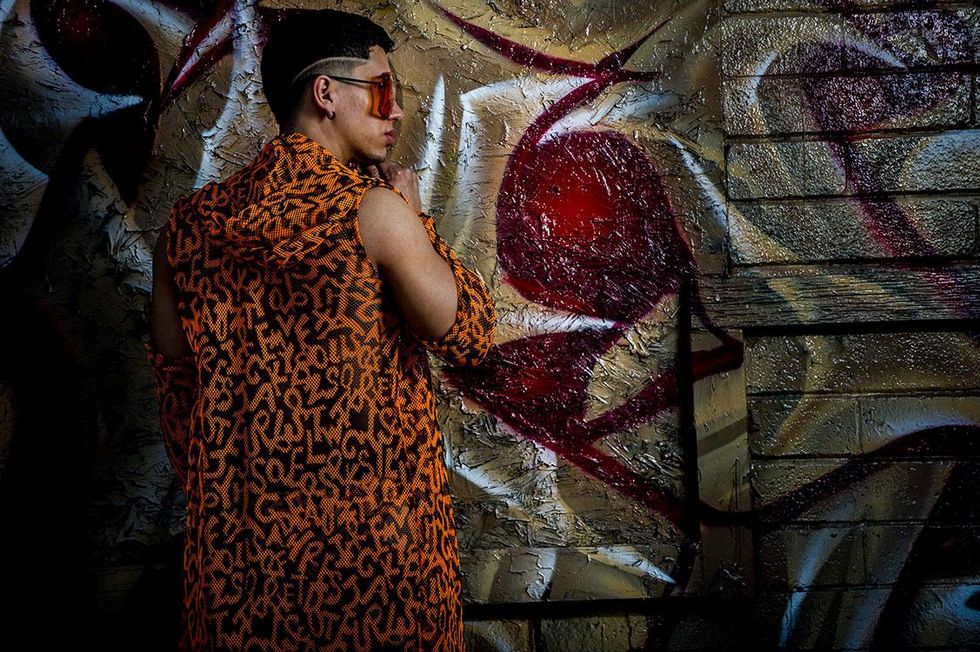 Sewn|Designed by Ron DuWayne for noralapparel.com. Photographer Frank Wise. Model Pawbloww