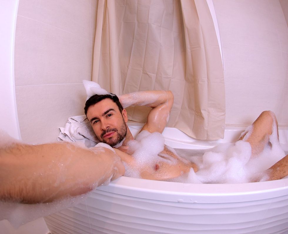 sexy gay man taking bubble bath naked selfie