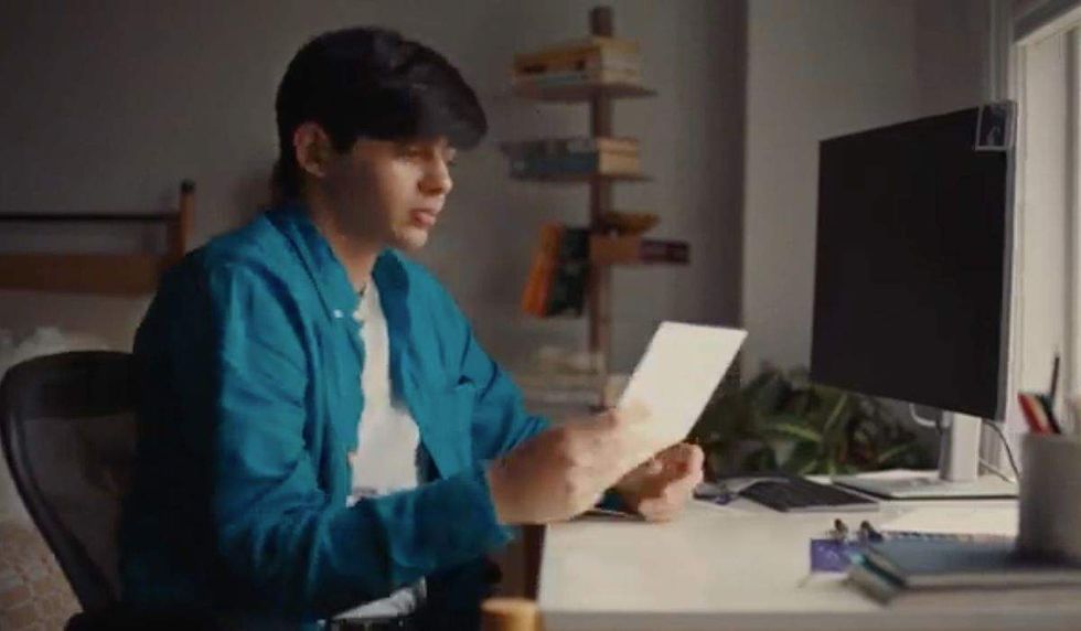 Sunwoo reading a letter