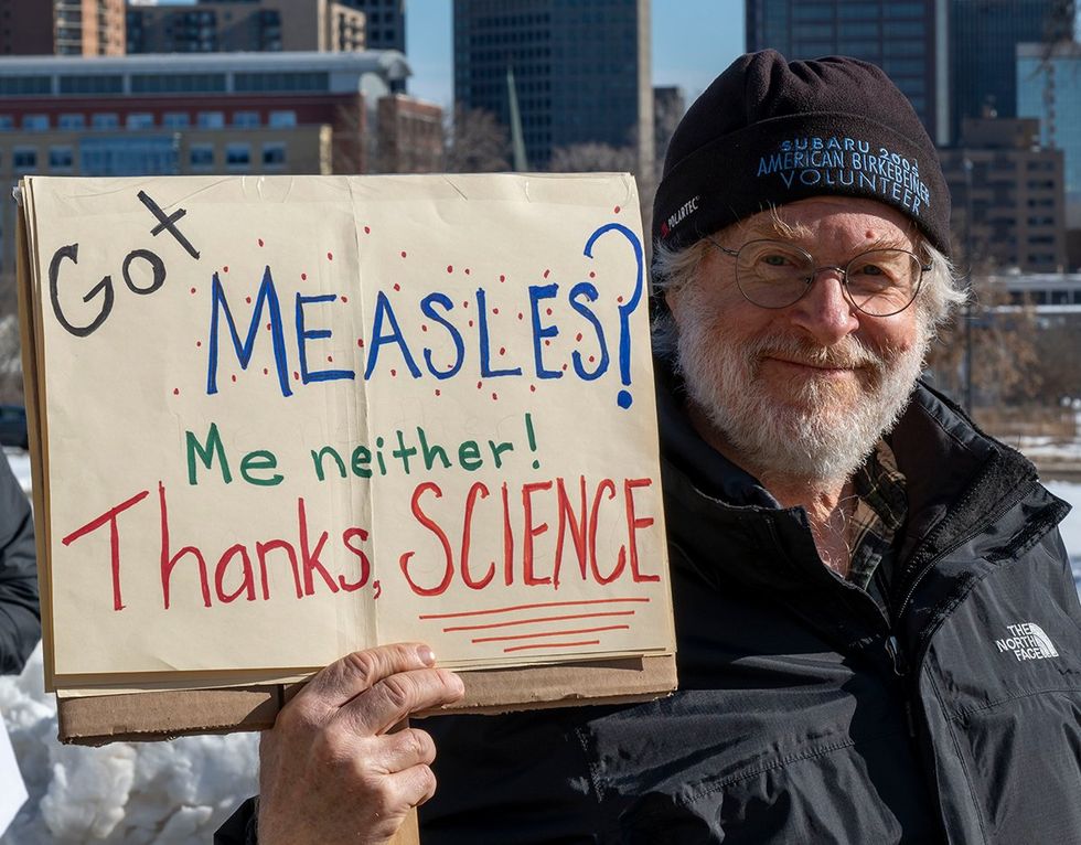 Stand up for science rally University of Minnesota 2025 sign no measles thanks science