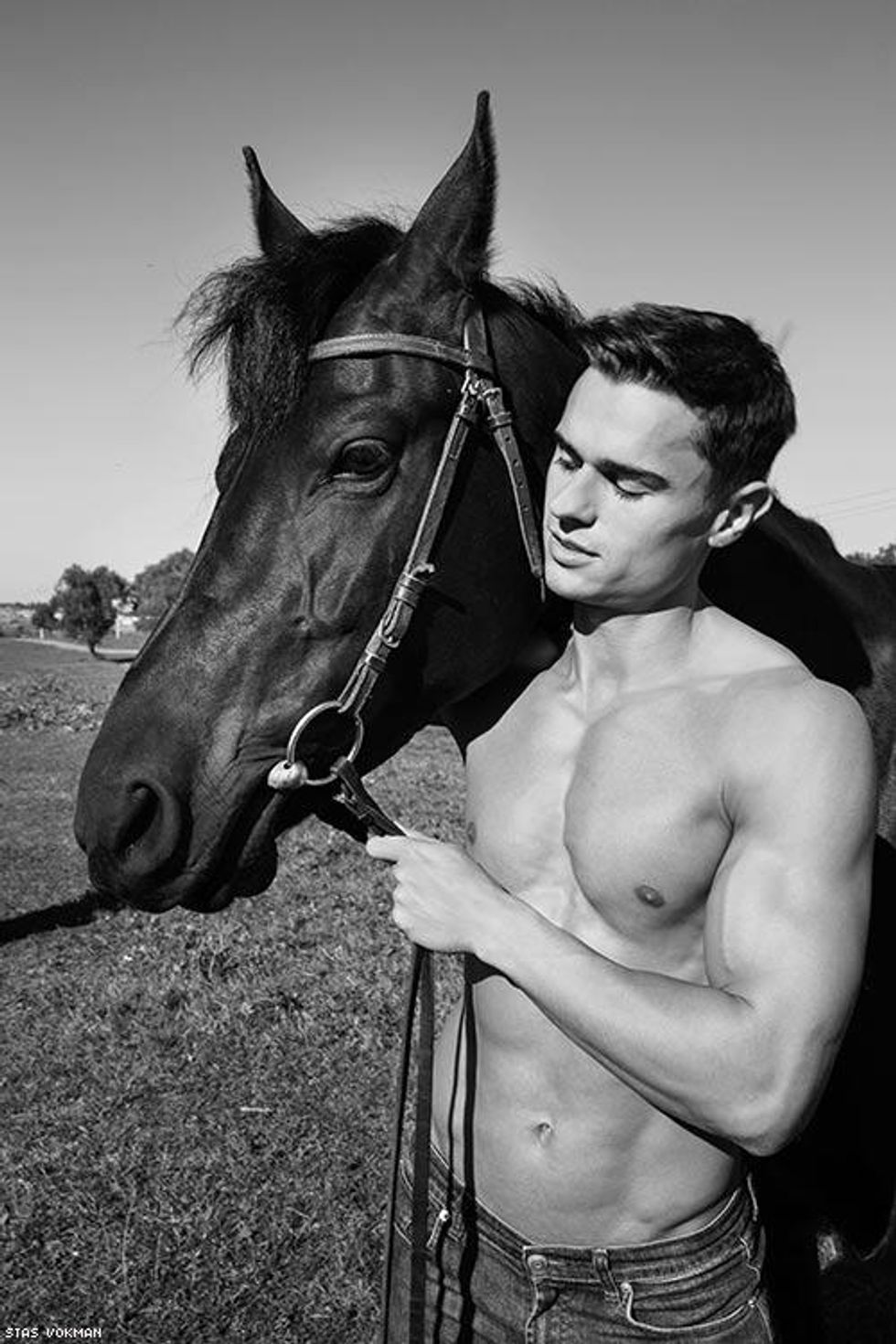 Stas Vokman's dazzling black-and-white images bring a crisp morning with a horseman and his horses to life.