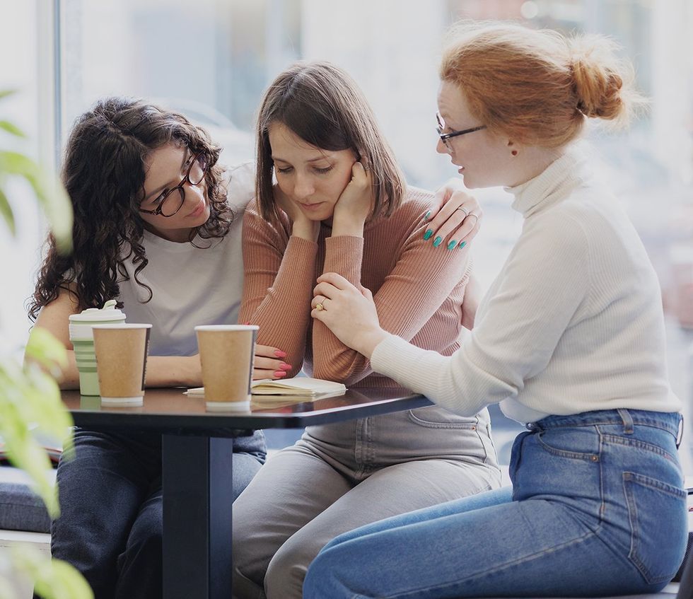 stressed woman supportive friends