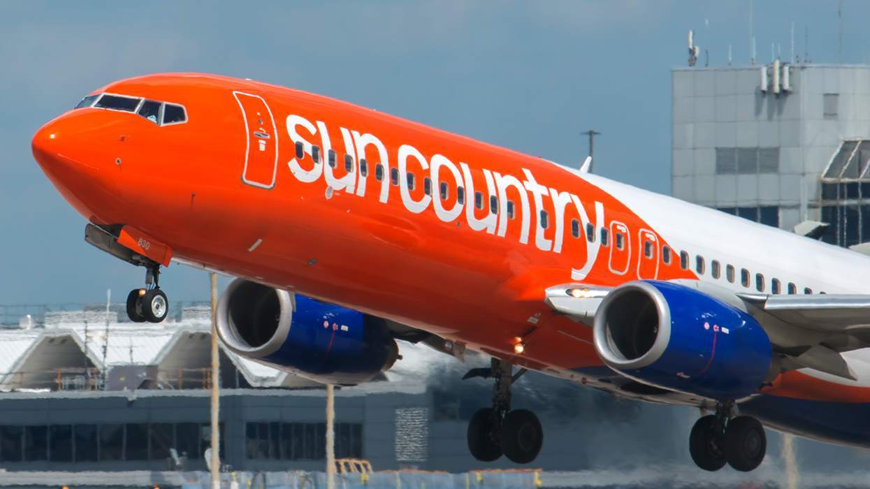 sun country airplane during takeoff