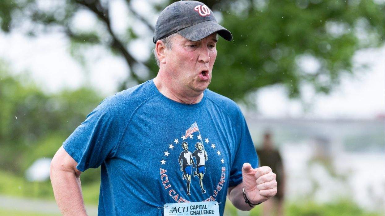 supreme court justice brett kavanaugh running in a race wearing sports clothes