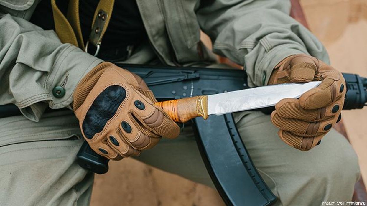 Taliban soldier with large knife