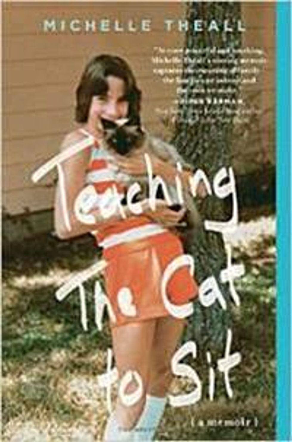 Teaching-the-cat-to-sitx200_0