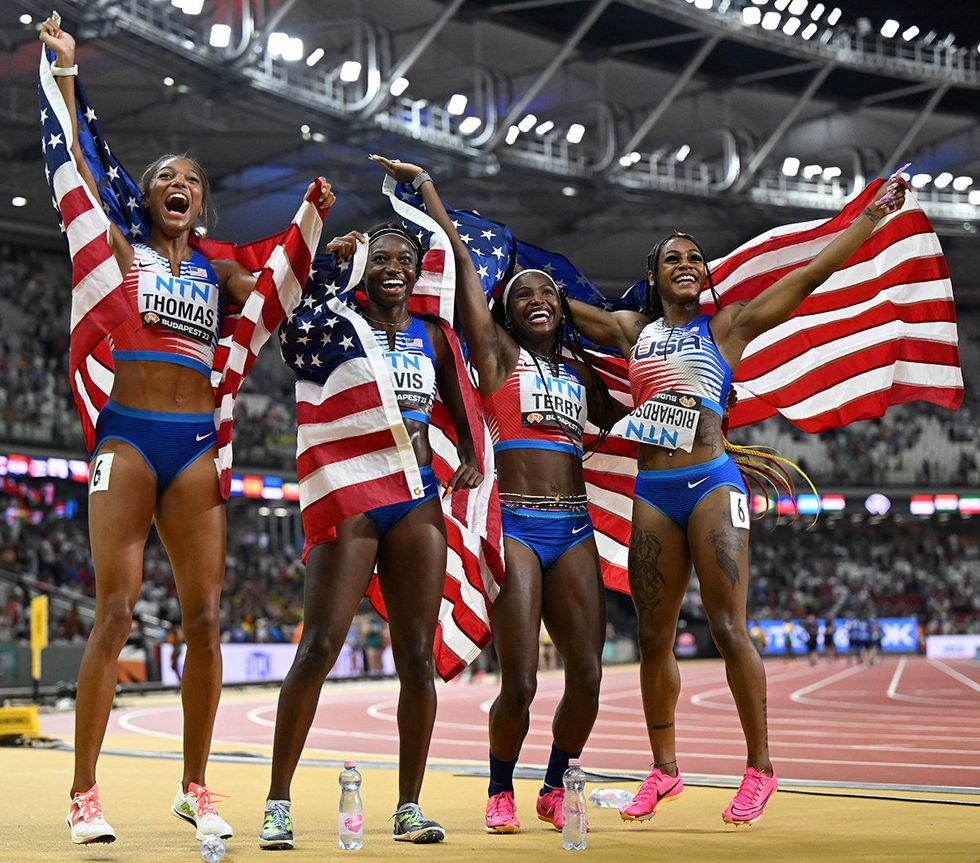 Team USA Gabrielle Thomas Tamari Davis Twanisha Terry and ShaCarri Richardson pose for a photo after they won the womens 4x100m relay final during the World Athletics Championships Budapest