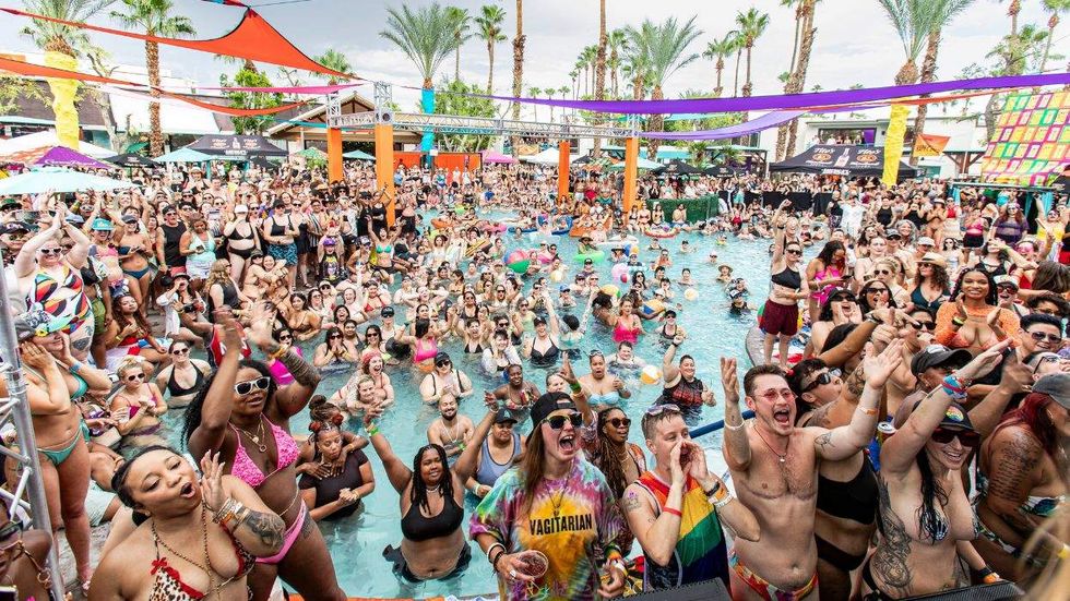 The crowd enjoying a pool party