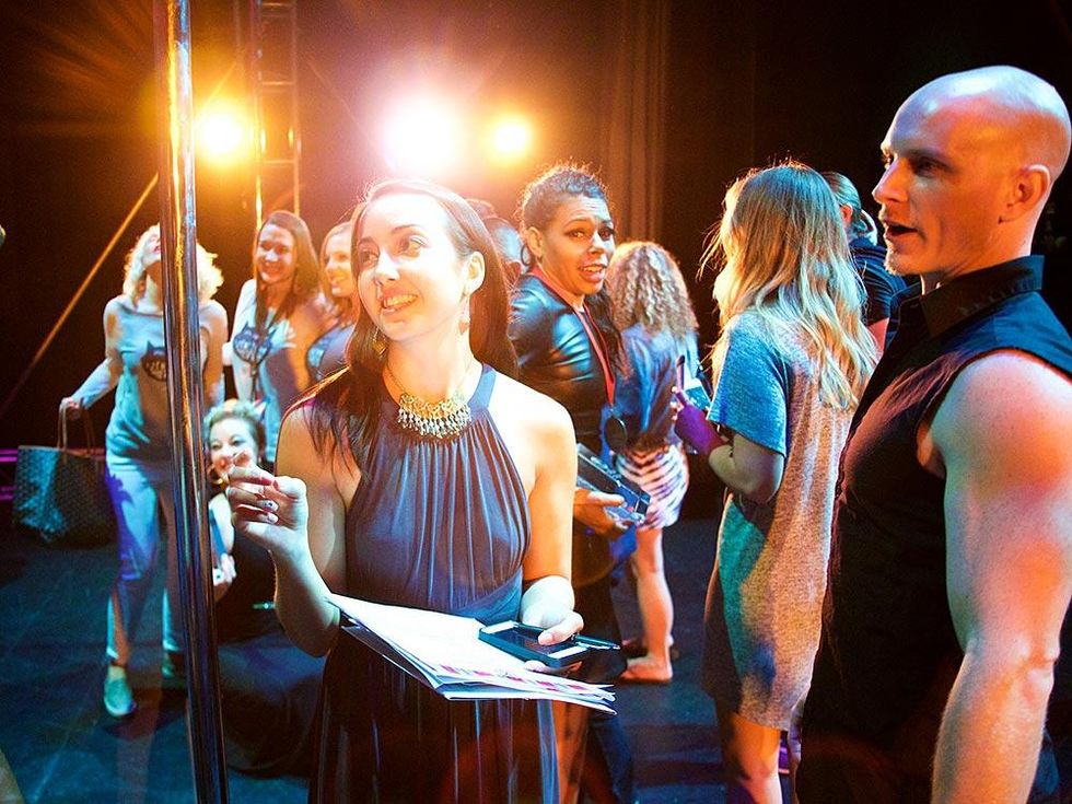 The excitement builds backstage at the Pole Sport Organization's competition.