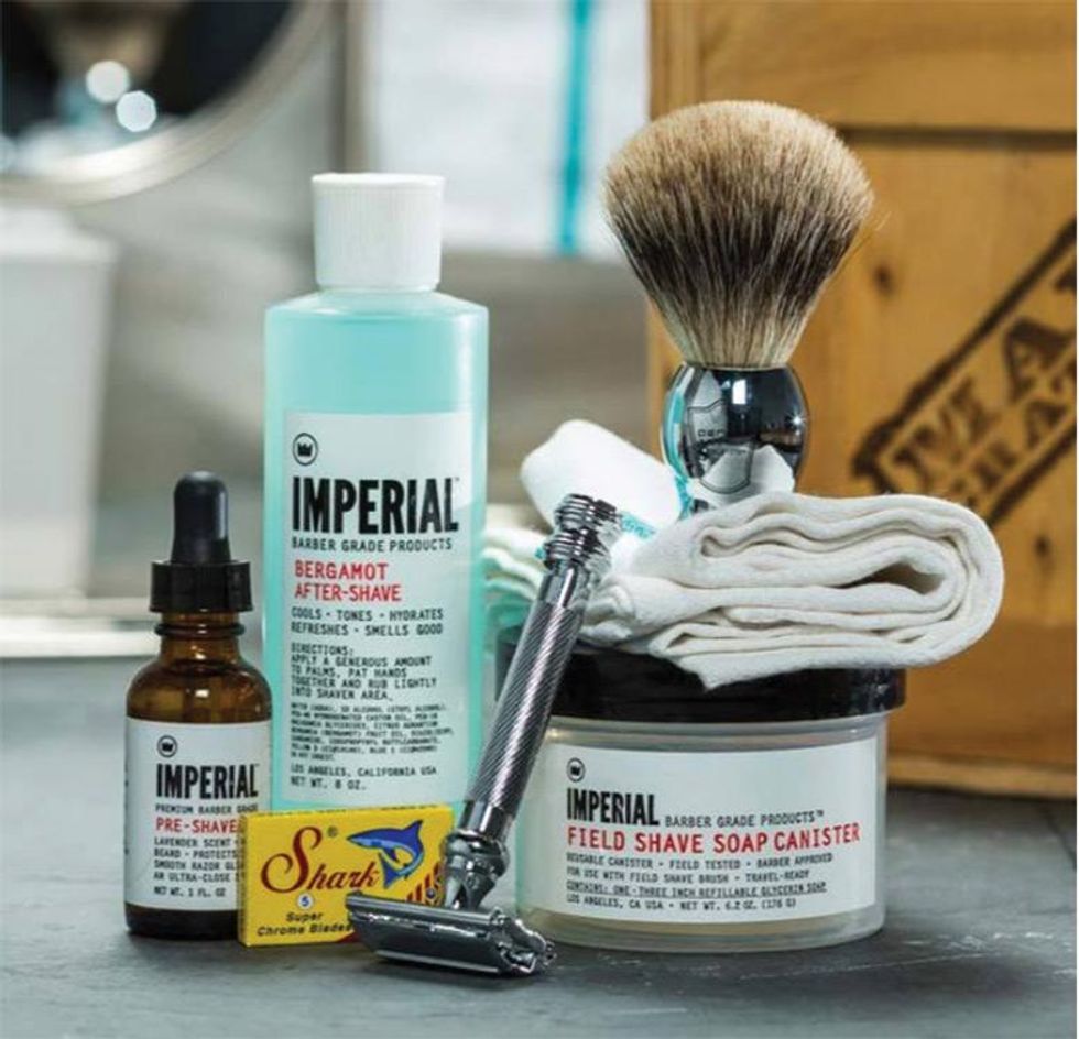 The wooden Clean Shave Crate includes a Parker straight razor, badger brush, oil, and bergamot aftershave. ($139 each, ManCrates.com)