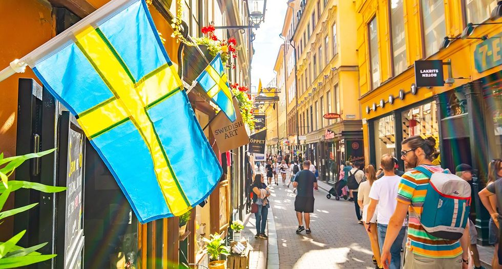 Top 15 safest countries for LGBTQ+ travelers - A bustling street in the Gamla Stan, or old town, of Stockholm, Sweden