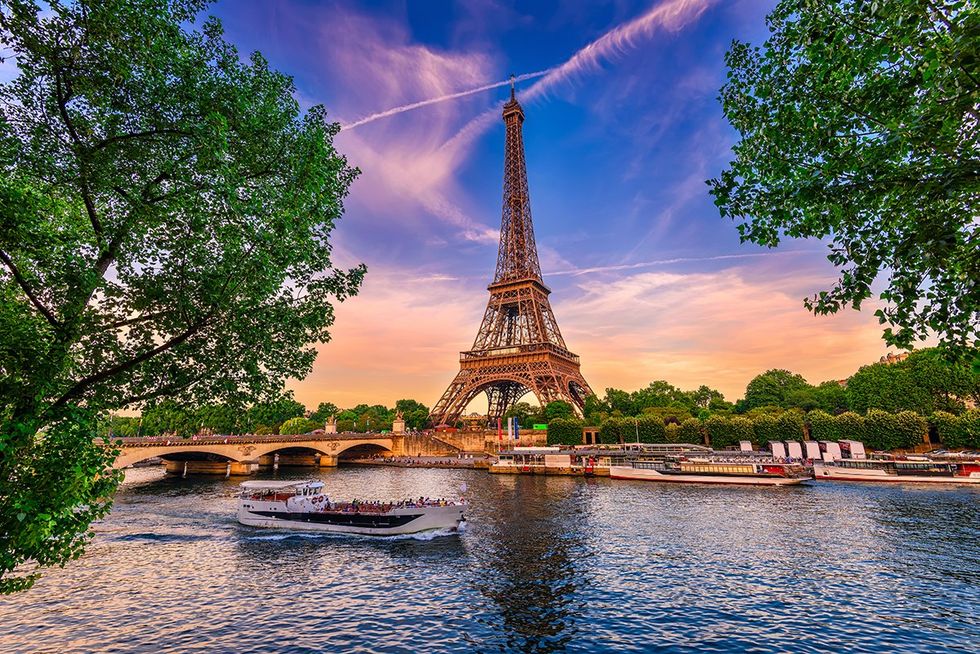 Top 15 safest countries for LGBTQ+ travelers - The Eiffel Tower and River Seine at sunset in Paris, France