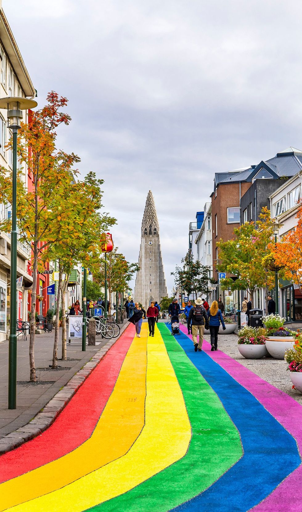 Top 15 safest countries for LGBTQ+ travelers - The rainbow-colored Skolavordustigur street leading to the Hallgrimskirkja Lutheran church in Reykjav\u00edk, Iceland