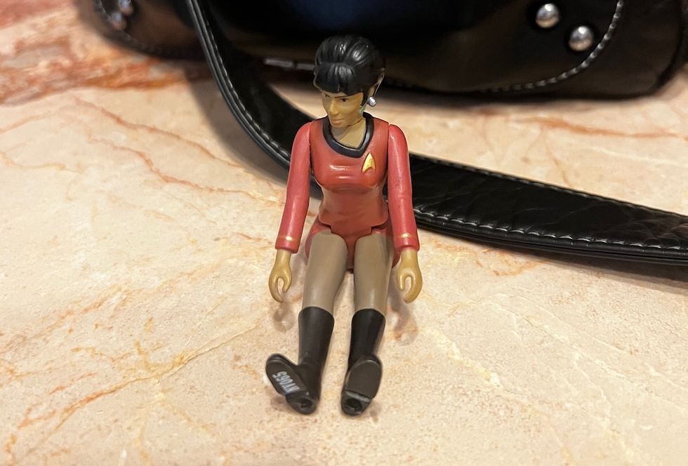 Toy action figure of Lt. Uhura from the original series of Star Trek, modeled on the late actress Nichelle Nichols.