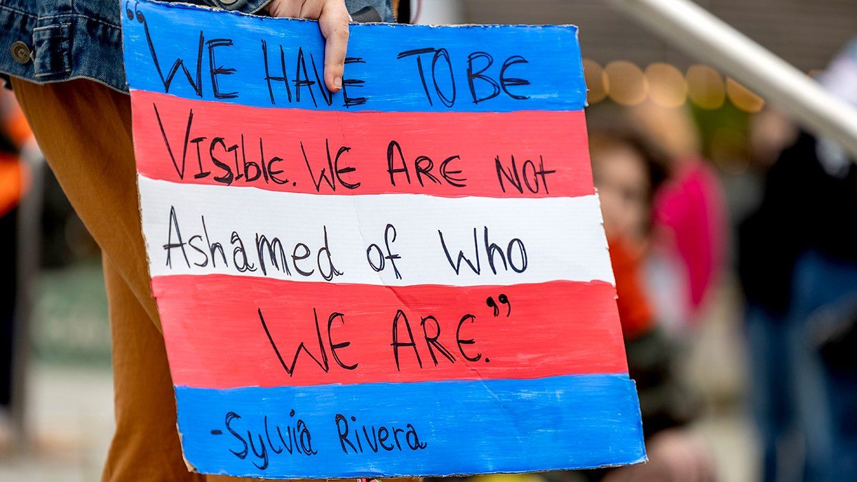 trans flag protest sign sylvia rivera quote