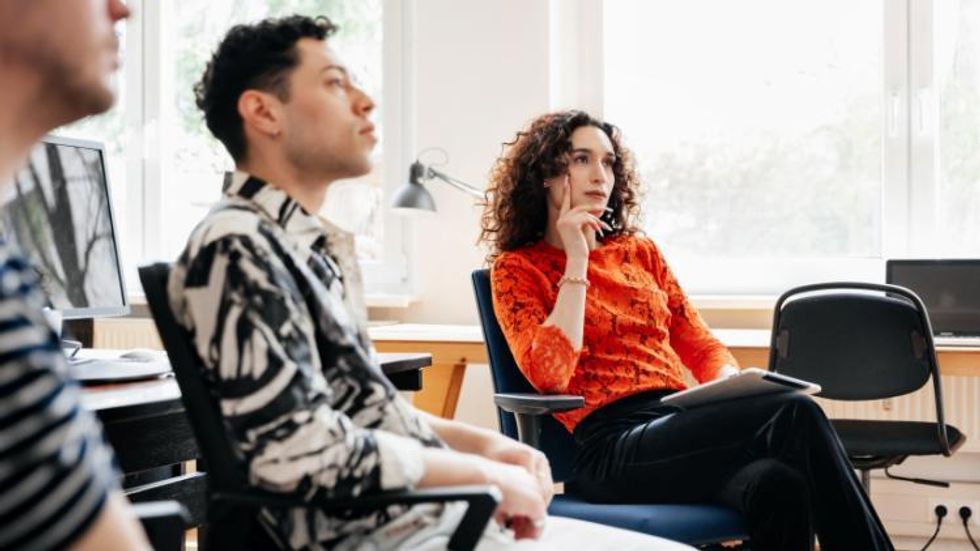 Trans woman at business meeting