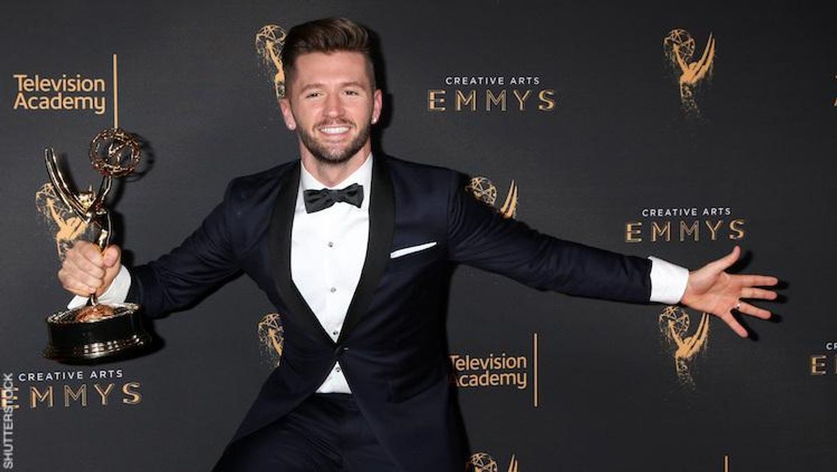 Travis Wall with an Emmy