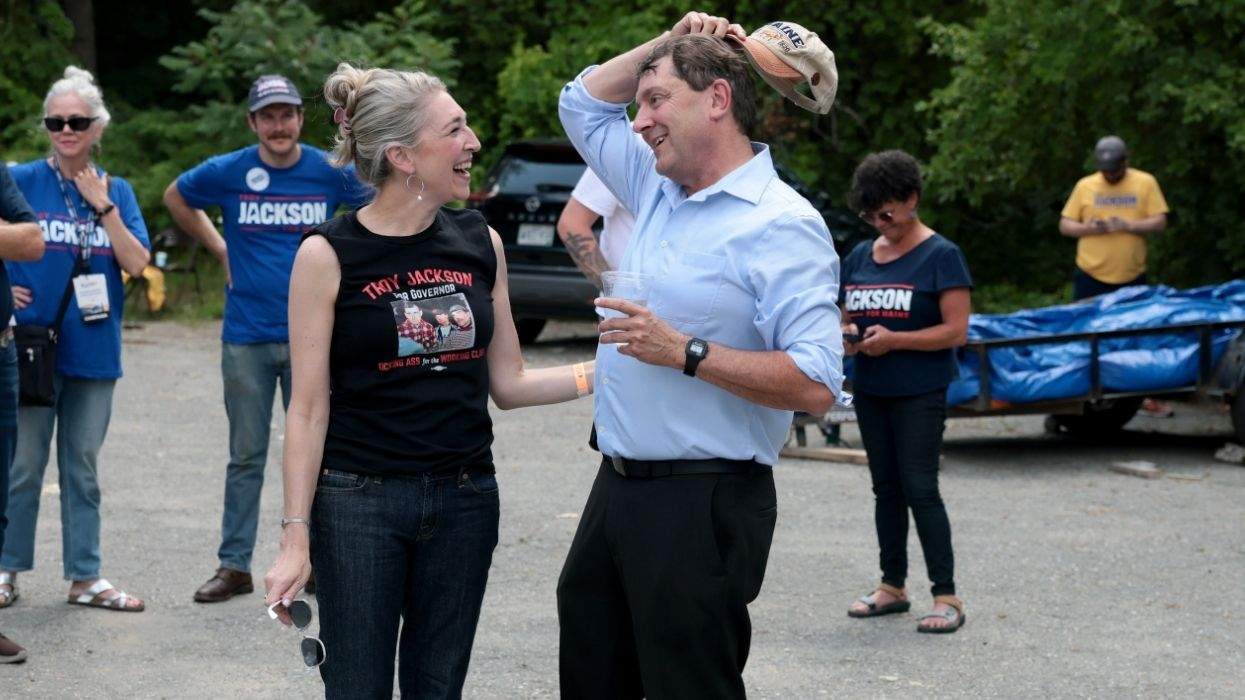 troy jackson speaking with a supporter