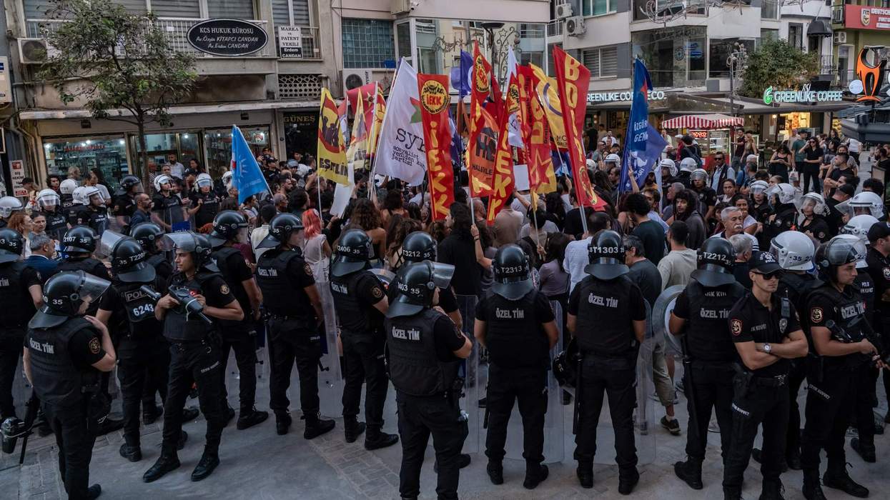Turkish police arresting LGBTQ+ people
