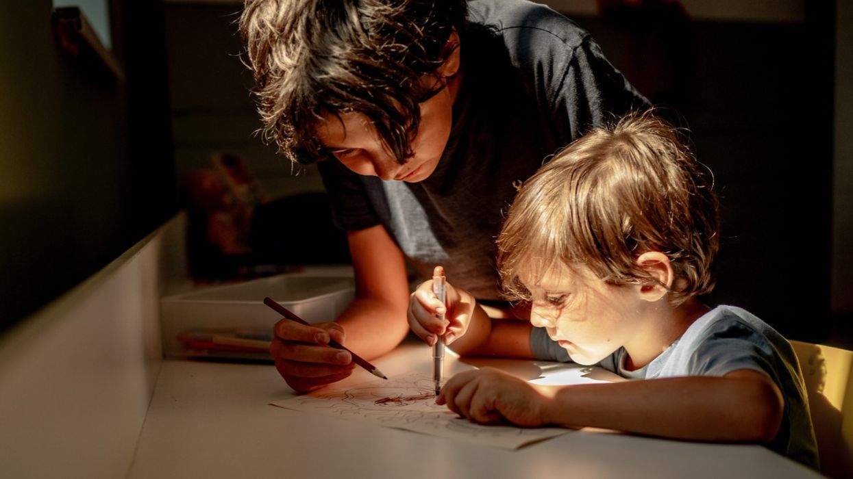 two children drawing