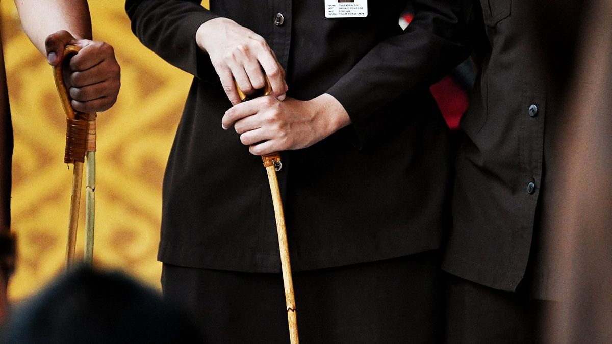 Two gay men publicly caned in Indonesia after being caught kissing