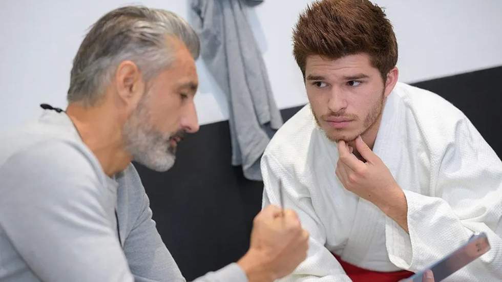 two men discussing business