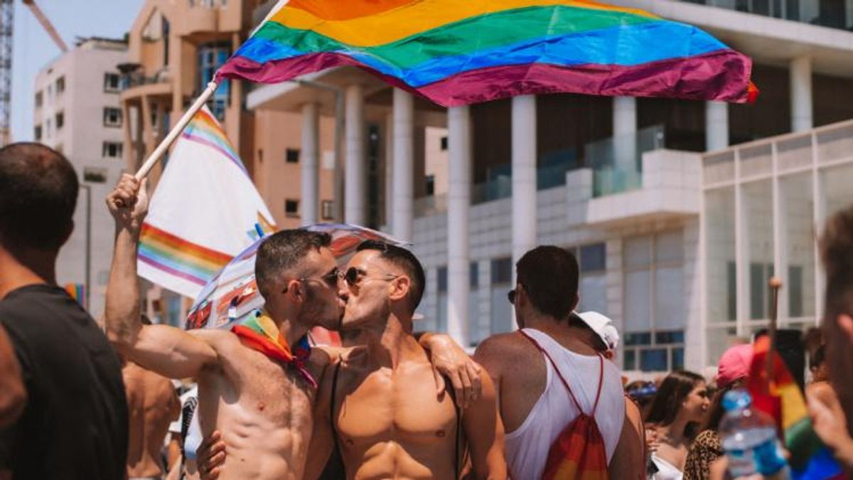 Two men kissing at Pride in Israel