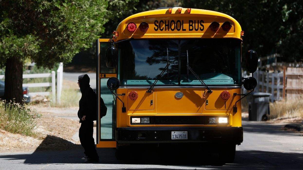 u.s. school bus with a child exiting