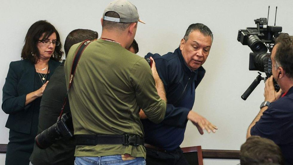 U.S. Sen. Alex Padilla is hauled out of Noem's press conference