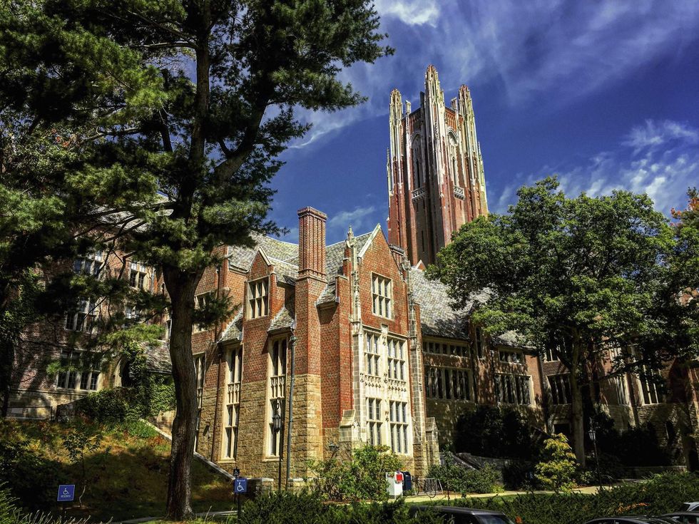 \u200bBell Tower and Green Hall at Wellesley College, located in Wellesley, Mass.