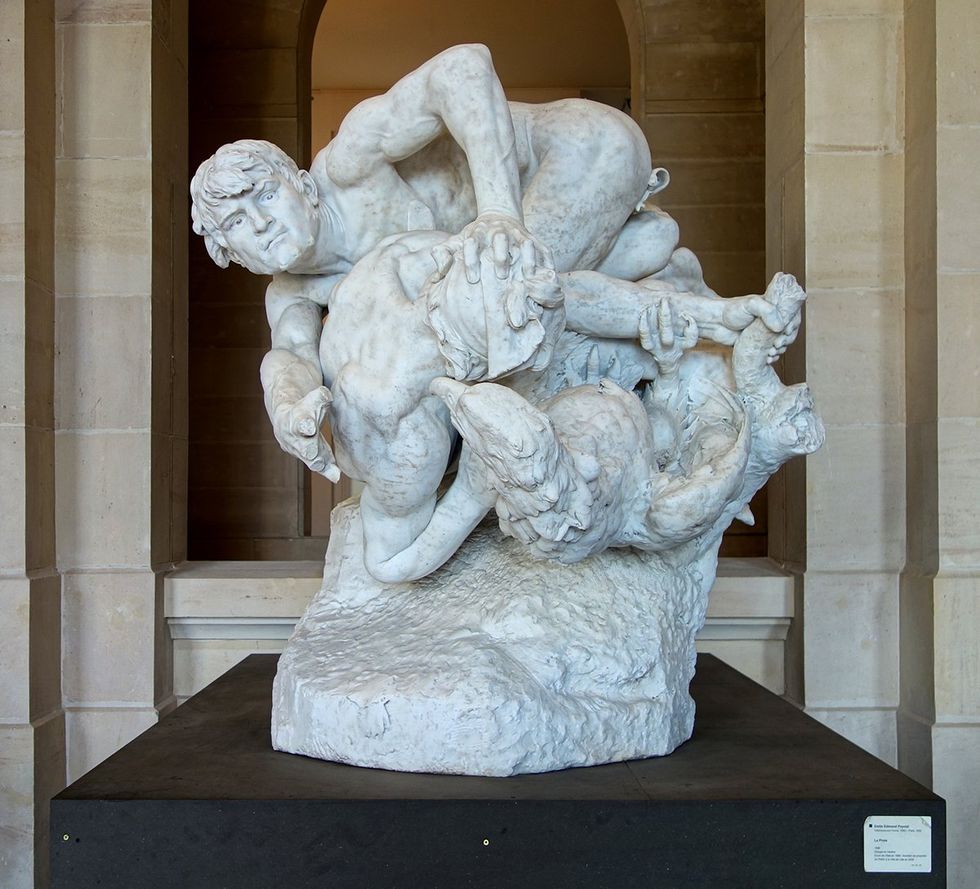 \u201cLa lucha eterna\u201d by French sculptor \u00c9mile Peynot.