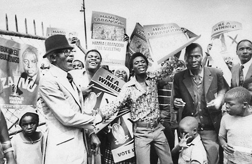 Under the auspices of Freedom House, Rustin attends a political rally in Zimbabwe/Rhodesia, April 1979. Courtesy Bayard Rustin Estate.