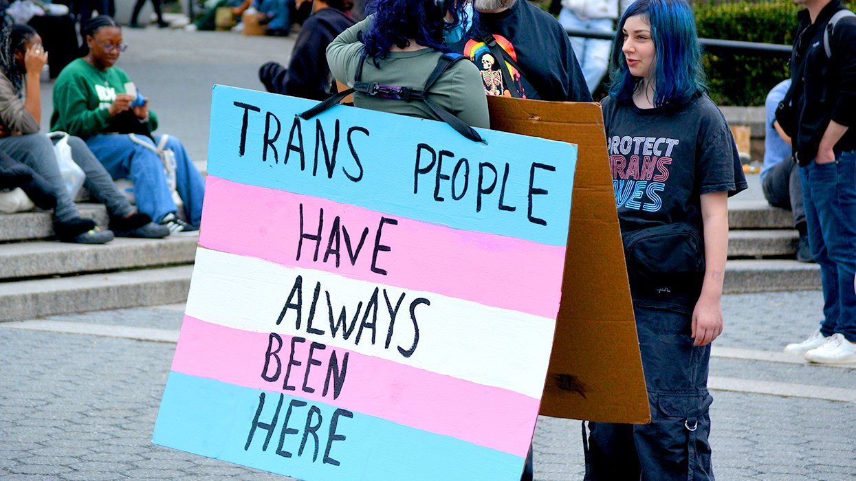 Union Square Manhattan NYC 2025 International Transgender Day of Visibility TDOV rally person wearing sign says Trans People Have Always Been Here