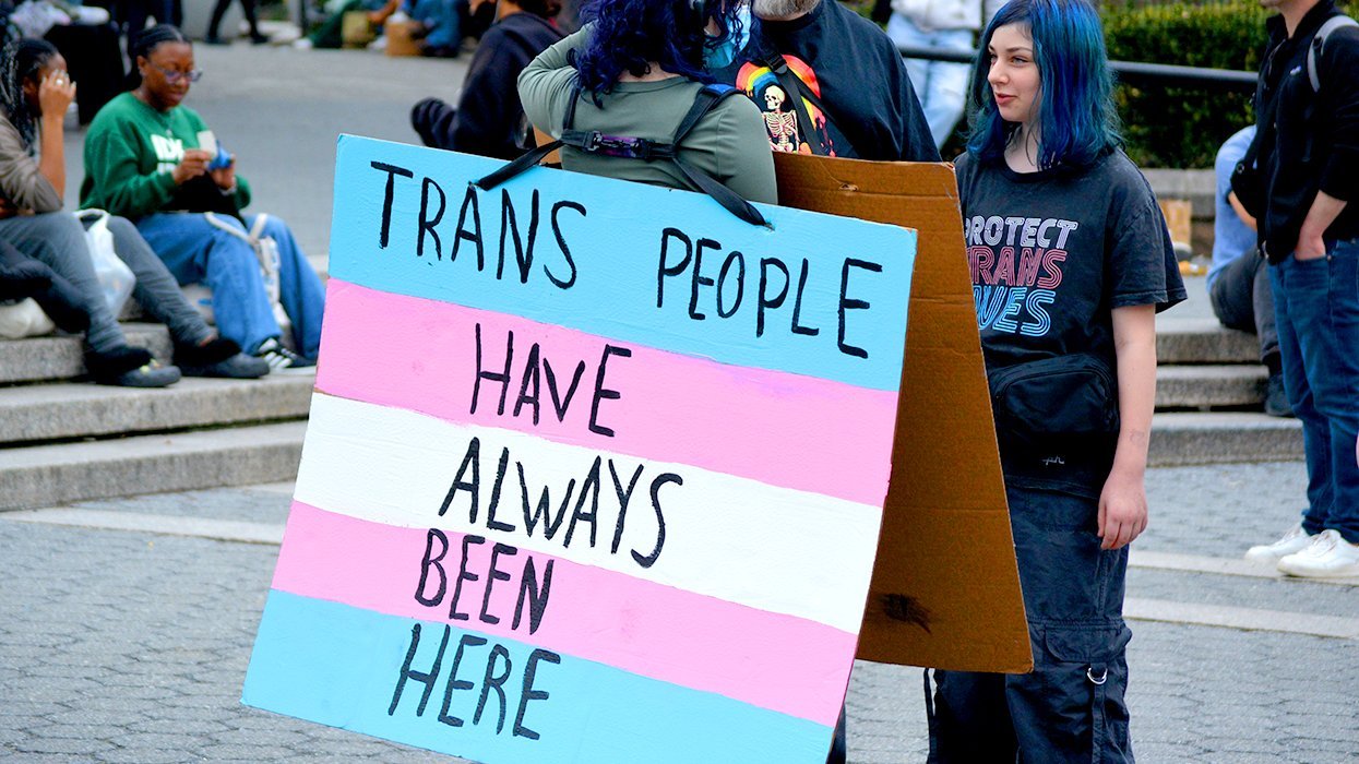 Union Square Manhattan NYC 2025 International Transgender Day of Visibility TDOV rally person wearing sign says Trans People Have Always Been Here