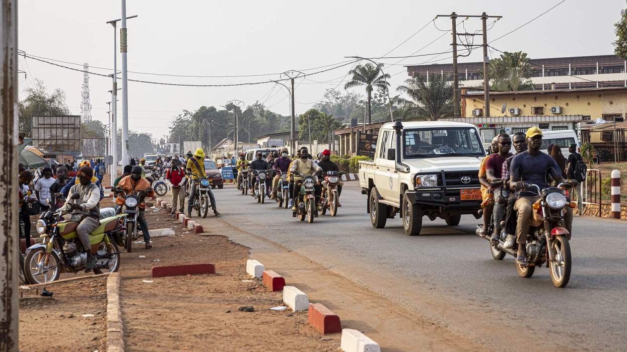 Vehicles drive on a road in Bangui, the capital of the Central African Republic.