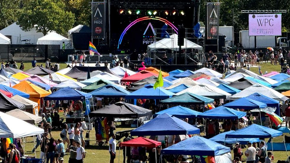 Vendor tents filling the park lawn in Atlanta for the 2025 Pride celebration