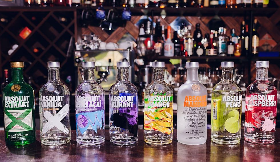 Vodka selection at a bar including seven types of Absolut