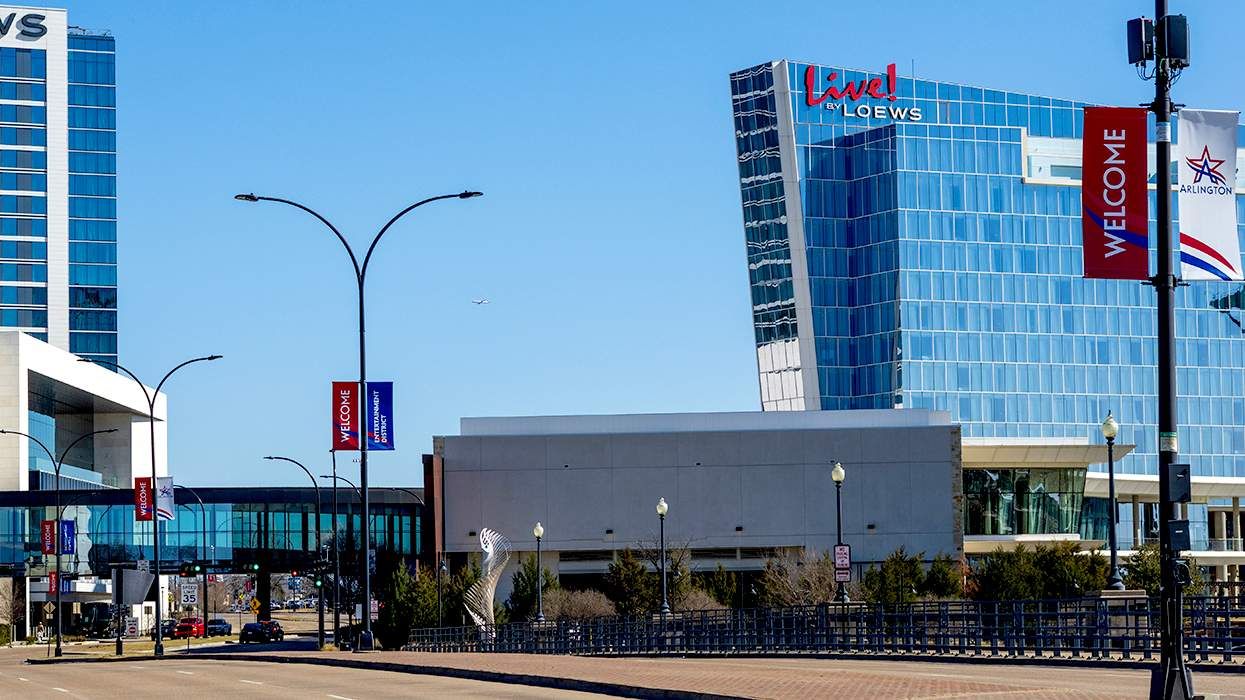 Welcome signs on main strip passing Lowes hotels Arlington Texas